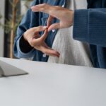 Person using sign language during video call on ta 2026 07 10 23 58 47 utc 1440x700